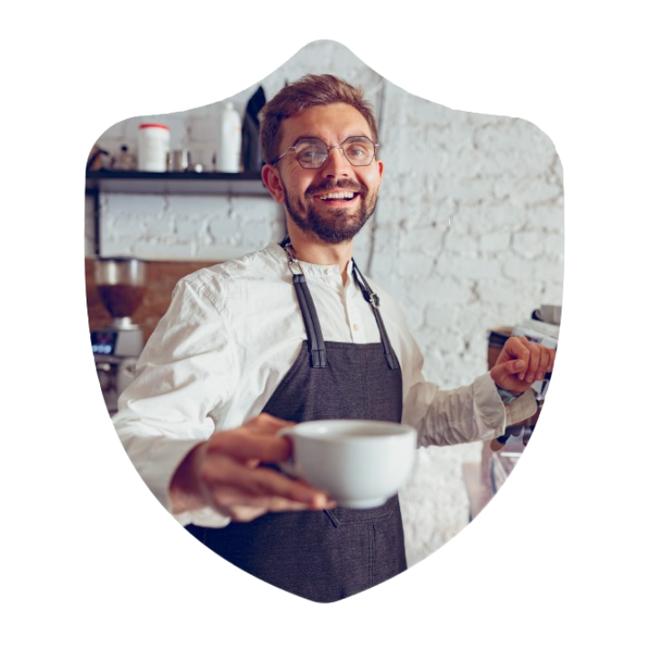 Barista serving cup of coffee